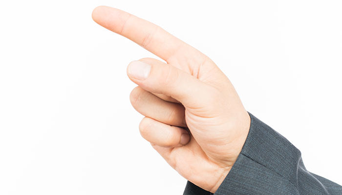 Dekorativt arkivbillede af en hånd med finger som peger